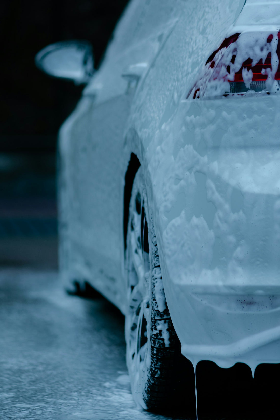 Foam-covered car during a wash